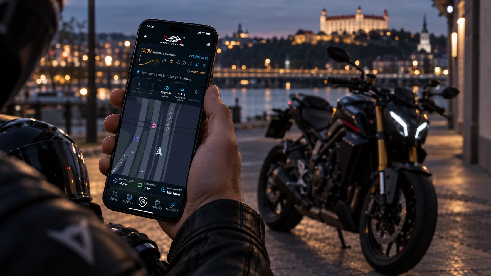 Sentrymo app and a motorcycle on an evening ride